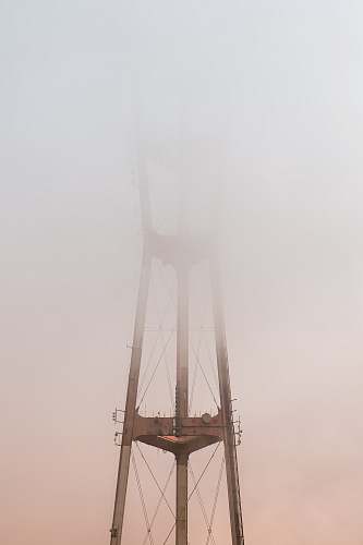 twin peaks gray network tower covered by white clouds san francisco